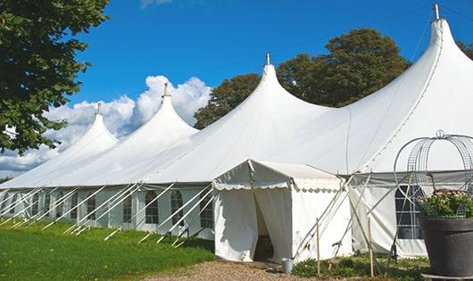 a group of luxury portable restrooms with individual stalls and running water in Belvedere